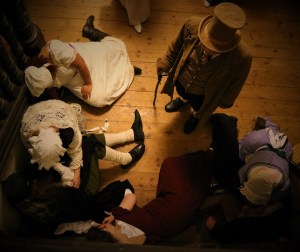 A group shot of player characters: someone appears to be ill.