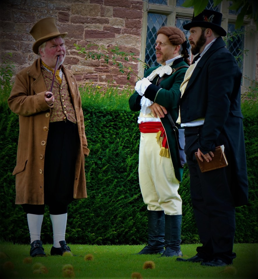 A triptych of characters of various statuses looking marvellous. The circumstances of their conversation is unguessable.